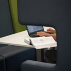 Student behind laptop AUAS